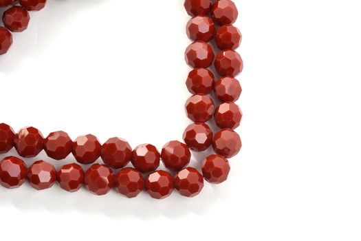Beautiful brown Glass Sparkle Crystal Isoalted Beads on white background. Use for diy beaded jewelry. Space for text