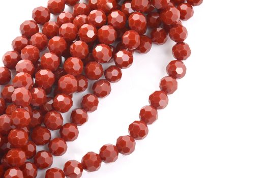 Beautiful brown Glass Sparkle Crystal Isoalted Beads on white background. Use for diy beaded jewelry. Space for text