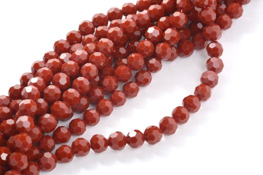 Beautiful brown Glass Sparkle Crystal Isoalted Beads on white background. Use for diy beaded jewelry. Space for text