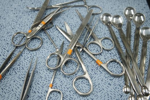 close-up view of sterile medical instruments for surgery on a table in operation theater