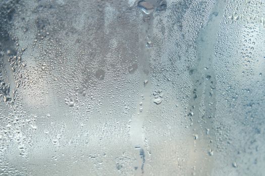 Bright grey color glassy texture, with water drops on it: abstract background
