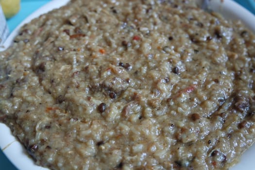 A close up view of Cooked white rice called Kichra served with green mint with traditional Charsadda recipe popular for its delicious taste in Pakistan