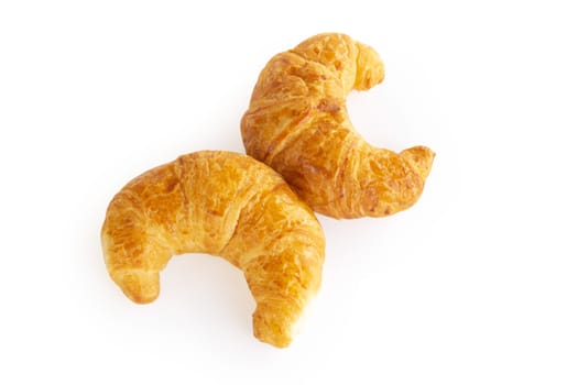 Fresh croissants isolated on white background