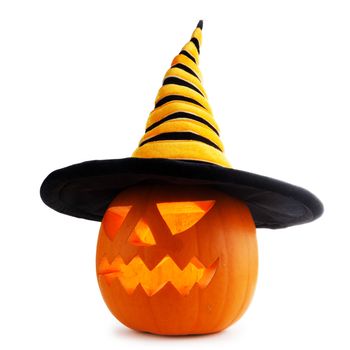 Jack O Lantern Halloween pumpkin in witches hat isolated on white background