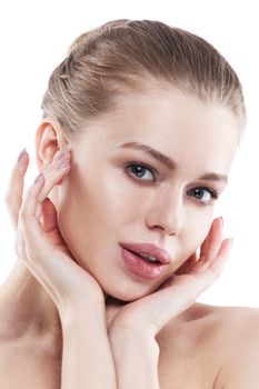 Portrait of a beautiful female model on white background, young woman with perfect skin