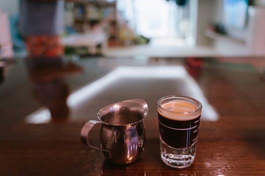 Cup of coffee on wooden table