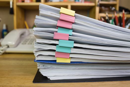 file folder and Stack of business report paper file on the table in a work office, concept document in work office