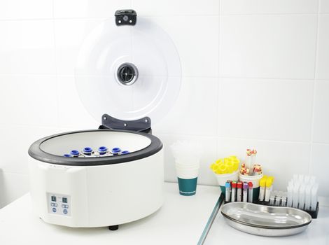 Laboratory medical centrifuge for the separation of blood components. High quality photo