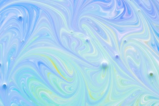 Abstract fluid pattern. Colorful painted background. Decorative marble texture. Soft focus