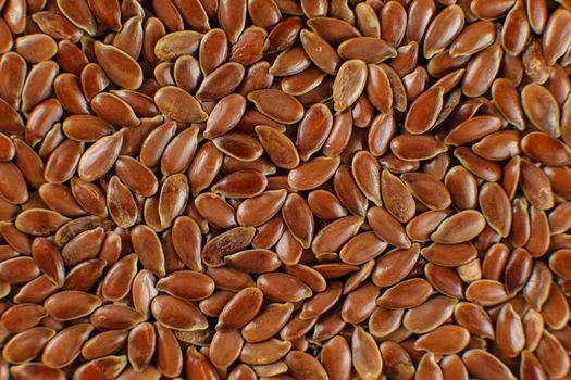 Closeup detail of flax seeds shot from above.