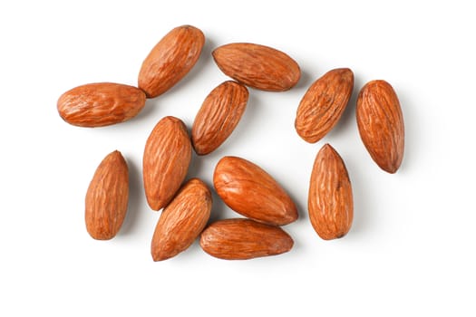 Top view on pile of almond nuts isolated on white background.