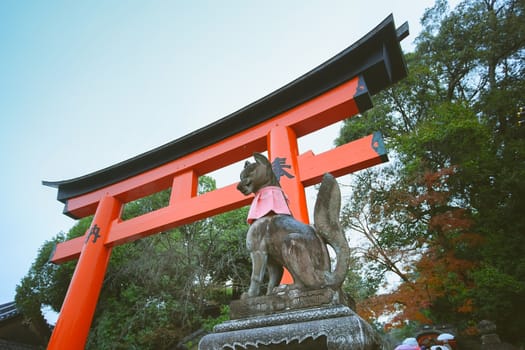 Fox statue in Fushimi Inari Taisha shrine, Kyoto, Japan.