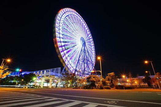 The famous travel destinations in Osaka Tempozan Ferris Wheel, Osaka city, Japan. This wheel is 112.5 metres height (369 ft) and 100 metres of diameter (330 ft).