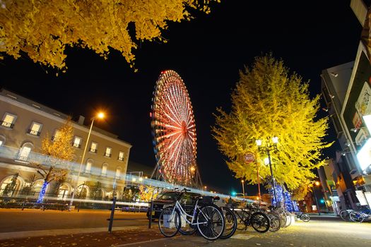 Osaka, Japan - December 16, 2019 : The famous travel destinations in Osaka Tempozan Ferris Wheel, Osaka city, Japan. This wheel is 112.5 metres height (369 ft) and 100 metres of diameter (330 ft).