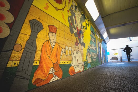 Osaka, Japan - December 16, 2019 : Beautiful sidewalk art through to Umeda Sky Tower, Osaka, Japan.