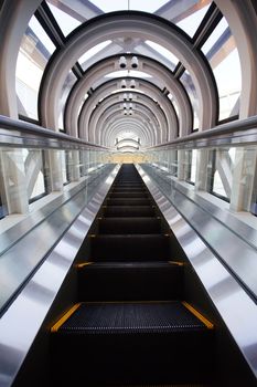 Osaka, Japan - December 16, 2019 : Long and high Escalator in the The Umeda Sky Tower in Osaka, Japan.