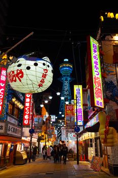 Osaka, Japan - December 15, 2019 : The famous Tsutenkaku Tower of Osaka city and Shinsekai shopping street, this is the travel destinations of Shinsekai district, Osaka city in Kansai area of Japan.