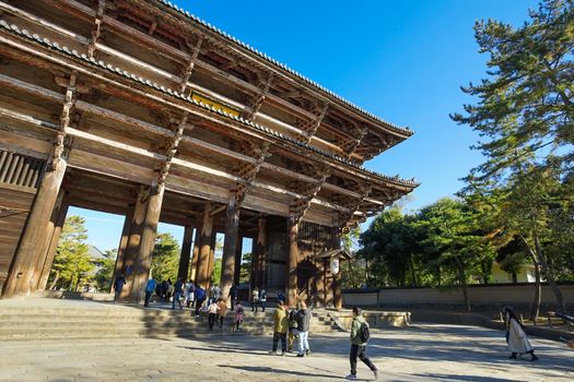 Nara, Japan - December 16, 2019 : The great Wooden gate Of Todaiji Temple, this is the most famous travel destinations of Nara city in Kansai area of Japan and this place has a lot of deers in the park.