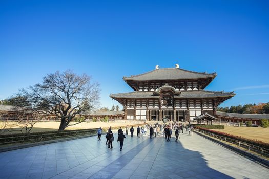 Nara, Japan - December 16, 2019 : The greatest wooden building in the world Todaiji Temple, this is the most famous travel destinations of Nara city in Kansai area of Japan and this place has a lot of deers in the park.