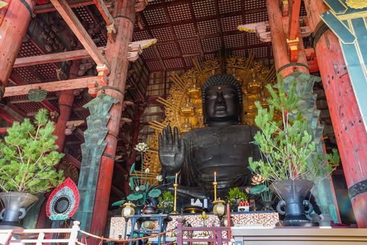 Nara, Japan - December 16, 2019 : The big Buddha statue enshrined in the main chapel of Todaiji temple, this is the most famous travel destinations of Nara city in Kansai area of Japan.