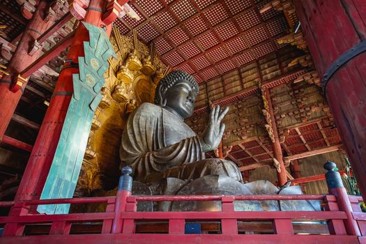 Nara, Japan - December 16, 2019 : The big Buddha statue enshrined in the main chapel of Todaiji temple, this is the most famous travel destinations of Nara city in Kansai area of Japan.