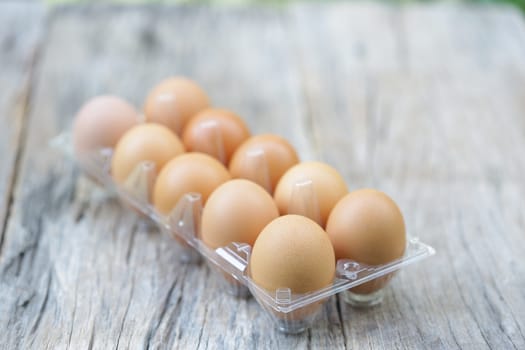 eggs tray pack on wooden table