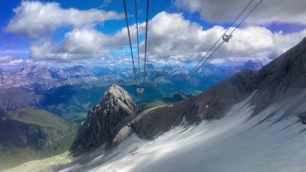 Slow motion of Marmolada Cable Car view in summer season, italian alps.