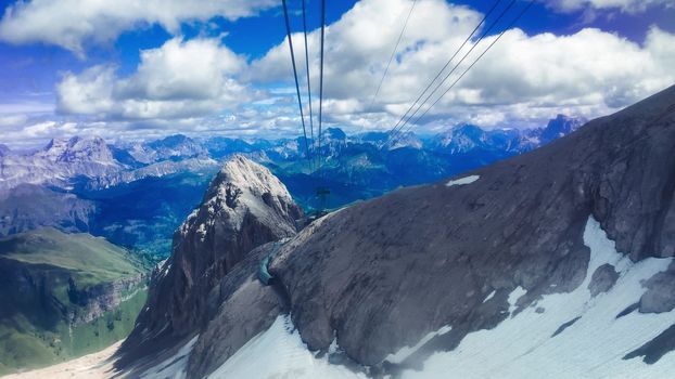Slow motion of Marmolada Cable Car view in summer season, italian alps.