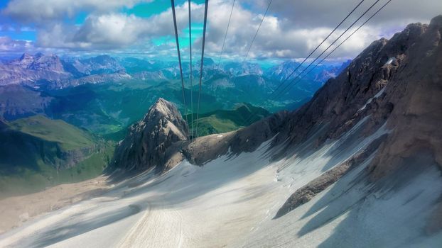 Slow motion of Marmolada Cable Car view in summer season, italian alps.