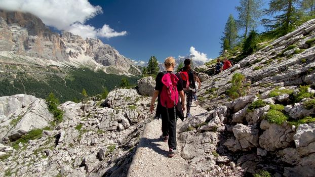 Family during an excursion in the italian alps.