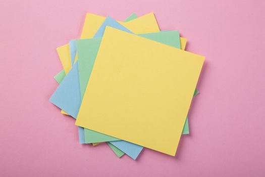 color blank notepad on color background
