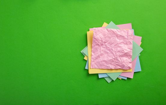 color blank notepad on color background