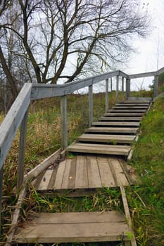 Wooden stairs to the top on the street
