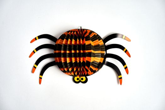 Halloween spider orange black paper craft white background isolated