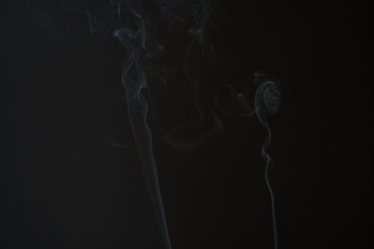 Smoke shape on black background with copy space for text