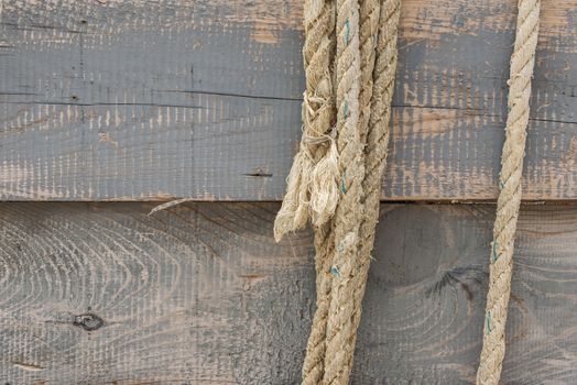 Boards and rope. Ropes on a wooden background