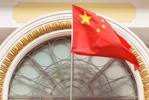 Chinese flag. Chinese flag on the facade of the building