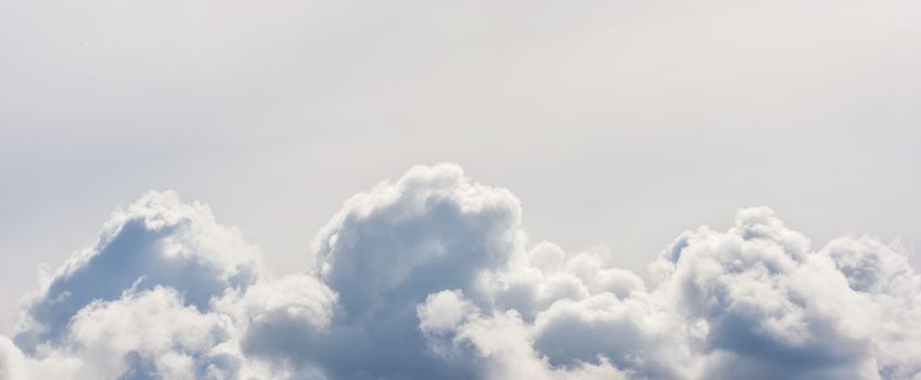 Cloud background. White clouds in the sky. White sky.