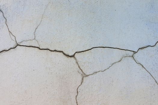 Old concrete wall. Cracked concrete wall background