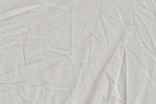 White textile background. Fabric of white color.