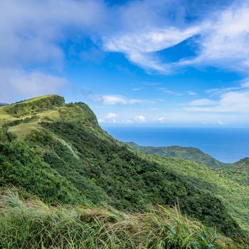 Beautiful grassland, prairie in Taoyuan Valley, Caoling Mountain Trail passes over the peak of Mt. Wankengtou in Taiwan.