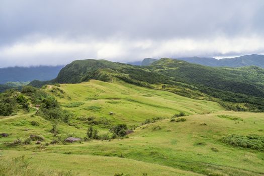 Beautiful grassland, prairie in Taoyuan Valley, Caoling Mountain Trail passes over the peak of Mt. Wankengtou in Taiwan.