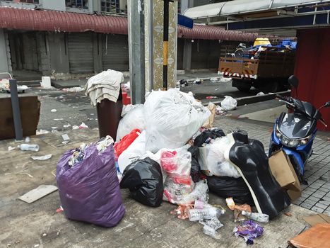 Many Garbage and dirty streets after holy festival Hari Raya Aidilfitri ramzan ramadan in Kuala Lumpur, Malaysia