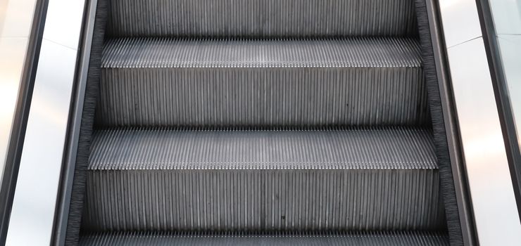 Empty steps of an escalator in a perspective view