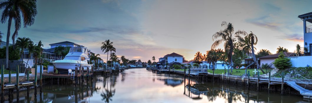 Waterway leading to the Ocean near Vanderbilt Beach in Naples, Florida at sunset.