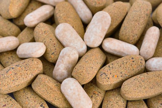 Herbal medicine in capsules. Alternative medicine tablets