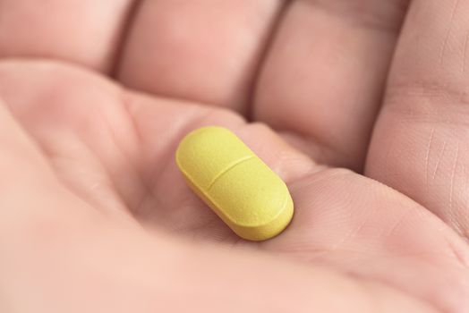 Medicine pill in hand. Pills and tablets. Medical concept.