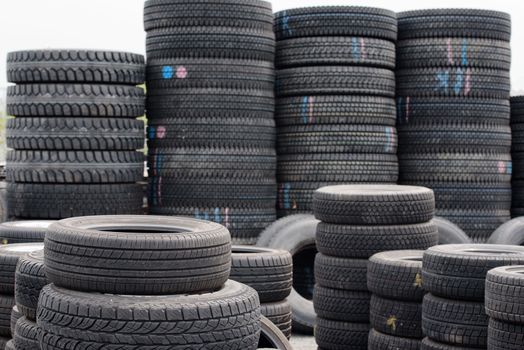 Car tires. Used old car tires at warehouse