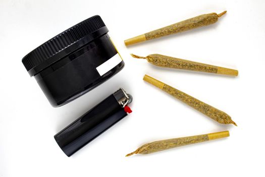 A Cannabis black plastic packaging container with Cigarettes, Prerolls or Joints and a lighter on a white background