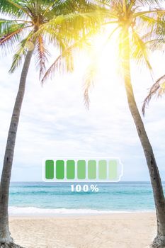 Fully charge battery 100% sign icon on natare summer beach on vacation day. Holiday long weekend relax time concept.